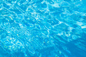 Beautiful pure blue water and a swimming pool.