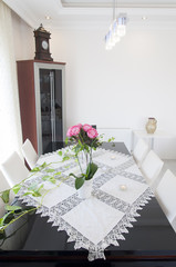 Dining room with empty dining table, table from top view.