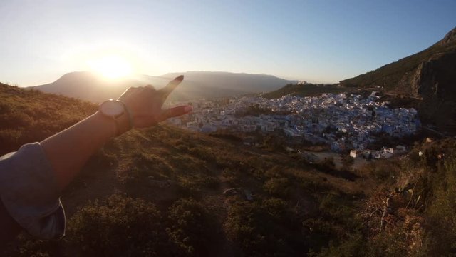 Admiring Chefchaouen cityscape at sunset, POV