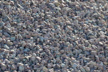 Breakstone background. Road gravel. Gravel texture. Crushed Gravel background. Piles of limestone rocks. Break stones on construction site.