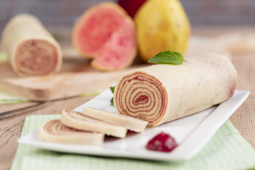 Bolo de rolo (swiss roll, roll cake) typical Brazilian dessert.