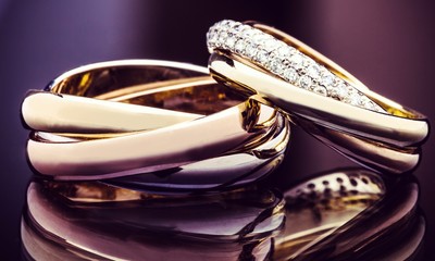 Engagement rings on background close up