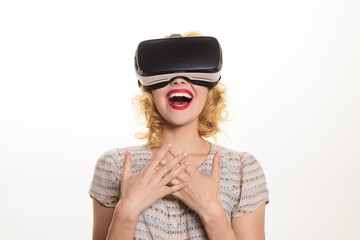 Beauty girl with VR headset. Excited woman with virtual reality glasses on head. Attractive sensual girl with red lips with VR device. 3d goggles. Entertainment. Virtual reality. Leisure. Games.