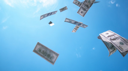 CLOSE UP: Money hundred $ dollar bills falling down from blue skies