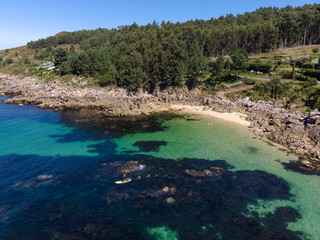 Obraz premium Aerial view of a beach with crystal clear water. Top view of beauty nature landscape with a tropical beach, top view