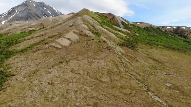 A flight over some mountains in alaska near Paxton.