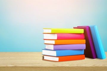 Colorful books collection on desk