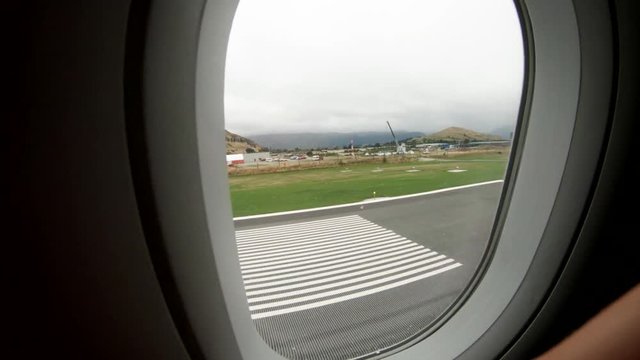POV, airplane lands in New Zealand airport