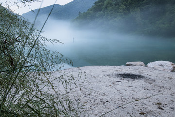 misty confluence of Soca and Tolminka river in Slovenia