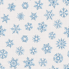 Seamless embroidery snowflakes background.