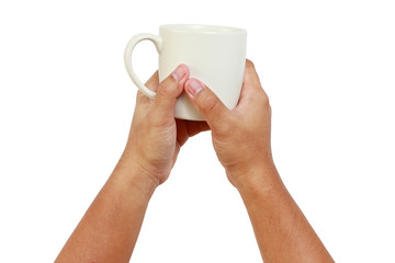 Two hands holding a white glass.