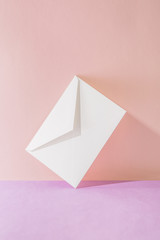 a white envelope, Pink & Purple Two Tone Background