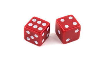Two red dice closeup, isolated on white background, six and four
