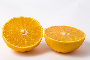 orange with half of orange isolated on the white background