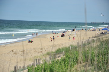 People on the beach during a sunny summer day