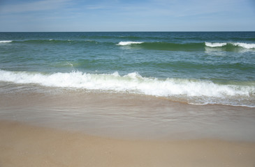 Waves breaking on the beach 