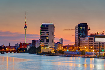 Dusk at the river Spree in Berlin with the famous Television Tower in the back © elxeneize