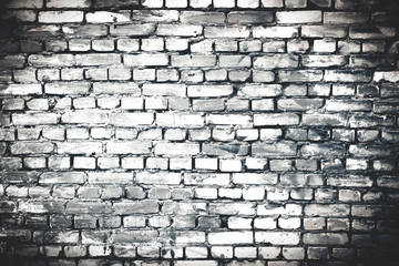 Black and white grunge brick wall. Old construction stones.