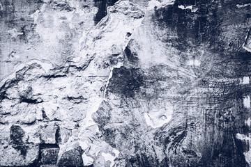 Black and white grunge brick wall. Old construction stones.
