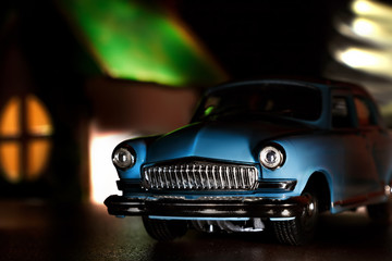 Model of a toy car of the 50-ies of the XX century in the interior.