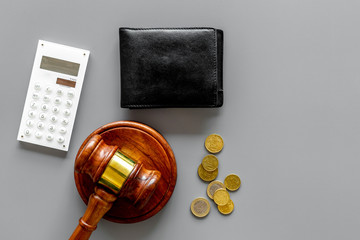 Financial failure, bankruptcy concept. Judge gavel, wallet, coins, calculator on grey background...