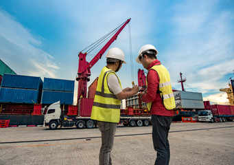 loading master, supervisor, foreman, port controller working in charge in port terminal, checking unit containers report online for loading discharging operation takes control by swift report 