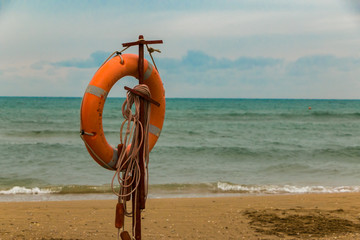 Inventory of rescuers on the beach. lifebuoy on the beach.
