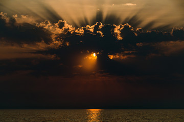 Sunset on the sea coast before the storm