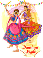 Obraz na płótnie Canvas Indian Woman playing Garba in Dandiya Night Navratri Dussehra festival