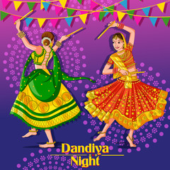 Fototapeta na wymiar Indian Woman playing Garba in Dandiya Night Navratri Dussehra festival
