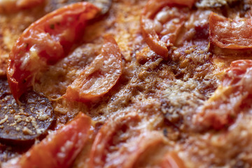 A close up of a pepperoni pizza
