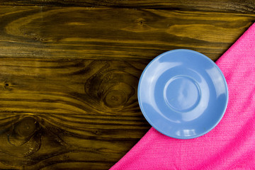 Color plate on wooden table