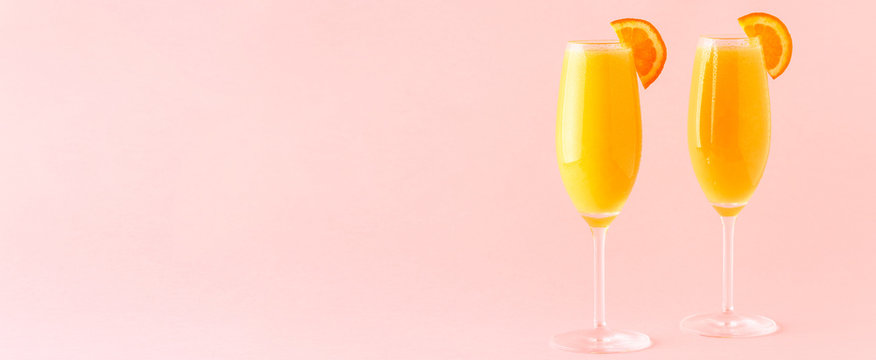 Yellow cocktail on a bright background.