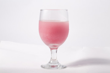 Glass with water with dissolving effervescent tablets vitamins.