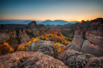 Magnificent morning view of the Belogradchik rocks in Bulgaria, lit by the autumn sun