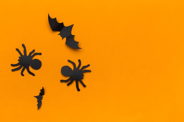 halloween and decoration concept - paper bats flying