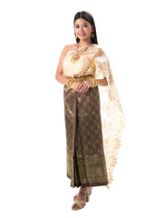 Cute girl in Thai national dress. Looks attractive and so elegant. Thai dress made from greatest Thai silk. Accessories made from gems stone, pearls and Gold. Her eyes looks charm like a spell.