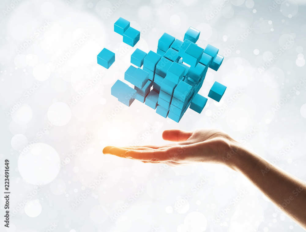 Poster cube color figure in male palm as symbol for integration. 3d rendering