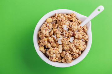 Bowl of homemade granola with nuts. Copy space
