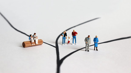 The miniature people of various generations.