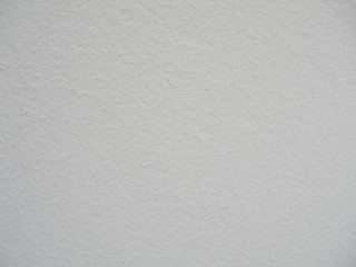 Closeup of white concrete wall texture.