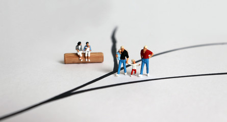 Homosexual couples and family concept. Miniature homosexual couples.