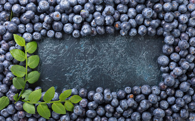 Ripe and juicy fresh picked blueberries closeup.
