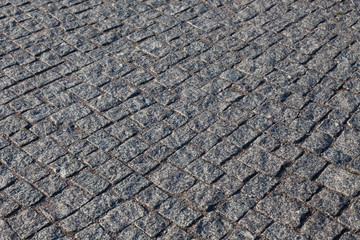 The pavement of granite cobblestones