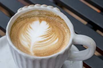 Coffee latte art in coffee shop cafe