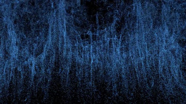 3d render simulated particles flow with depth of field effect. A lot of magical like particles goes from the bottom to the top of the screen with turbulence force is beeing affected to it.