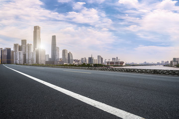 Road pavement and Guangzhou city buildings skyline