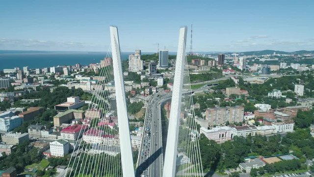 Aerial drone view of The Zolotoy Golden Bridge. Cable-stayed bridge across the Zolotoy Rog (Golden Horn) in Vladivostok, Russia