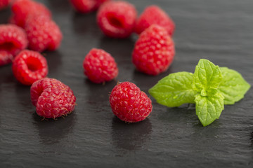 Raspberry berries on shale plate