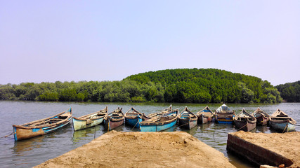 Fototapeta na wymiar Original fishing boat on beach in Goa, India